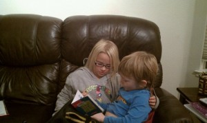 eli and ellie reading, caught in the act of reading, pragmatic mom