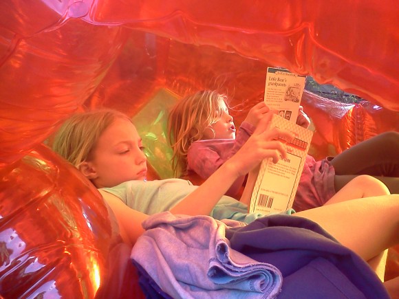 Caught in the act of reading in blow up bubble pragmatic mom