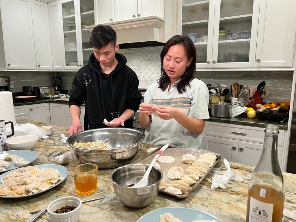 Tai Lee making mandu dumplings with Ali Lee